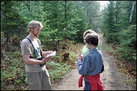 Alan Belford leads a bird watching expedition in the Adirondacks.