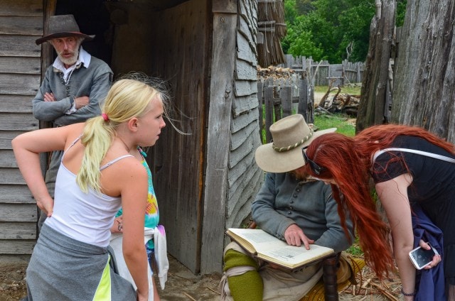 Colonist pours over law books - Plimoth Colony - Plymouth MA